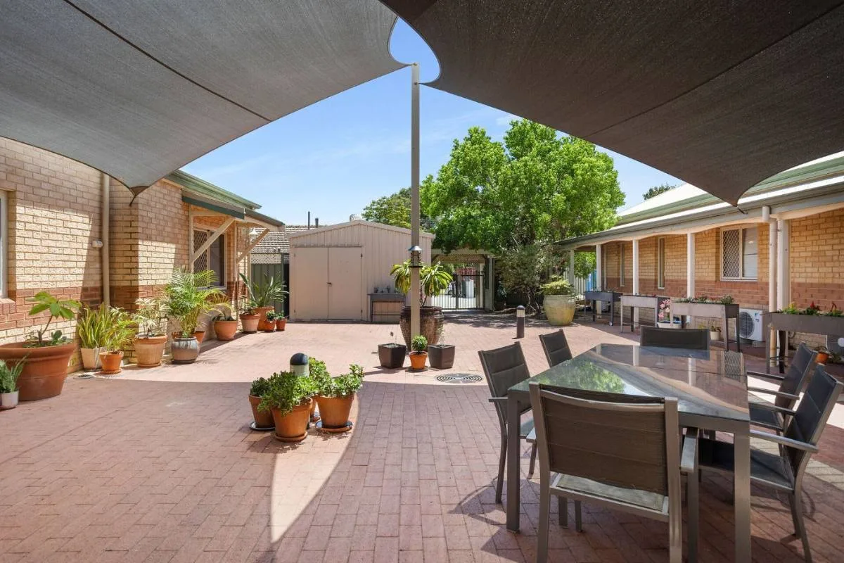 A shaded courtyard at a partner home